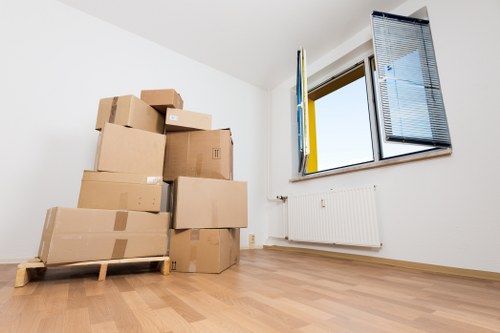 Flat removals team loading belongings in a Haringey street