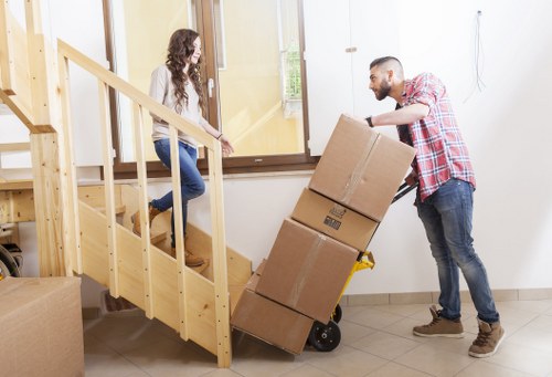 Loading furniture into a van for a local move in Haringey